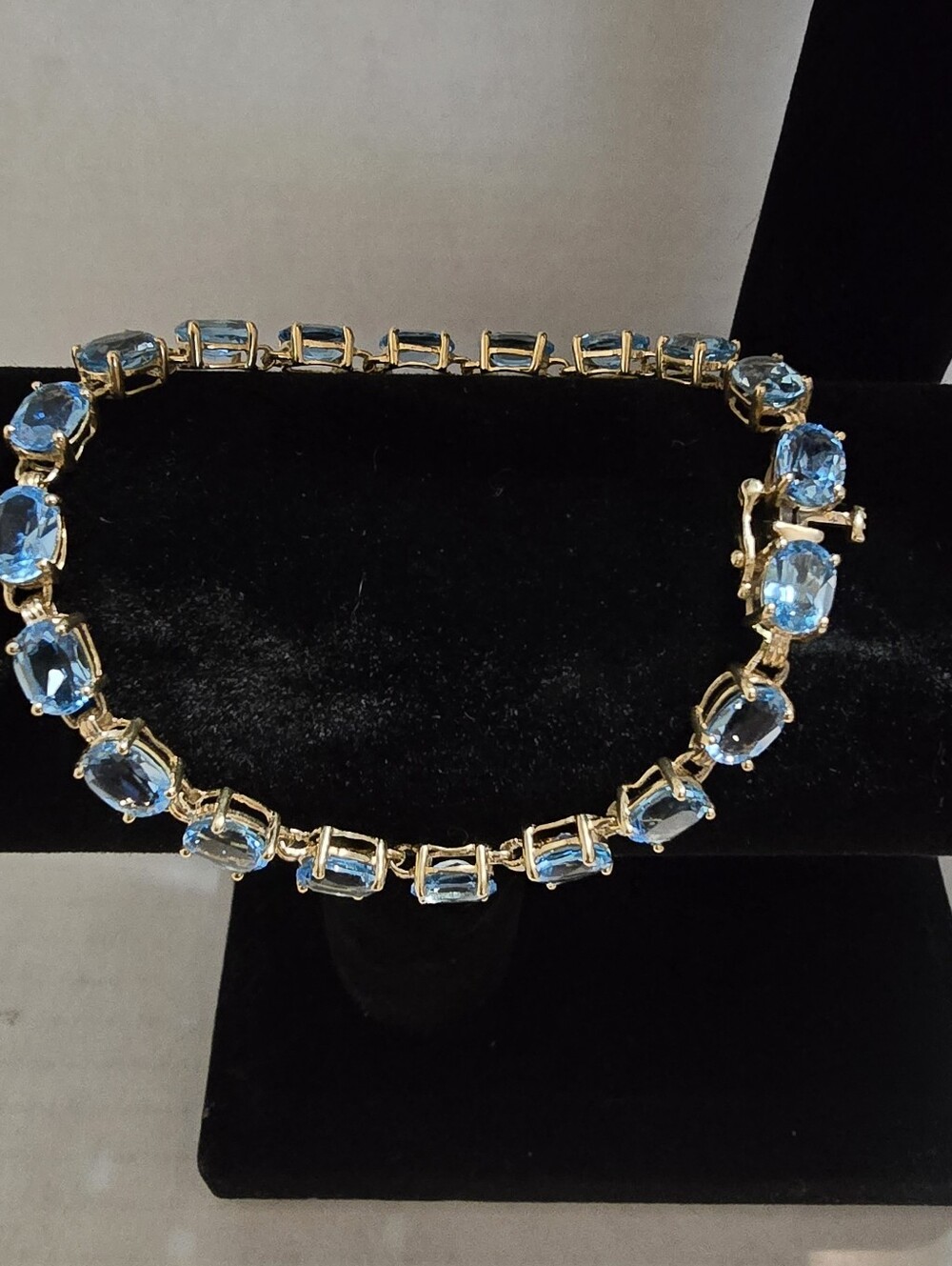 Designer 'IL' 10k Yellow Gold/Blue Faceted Topaz 7.25" Tennis Bracelet 9.28gr
